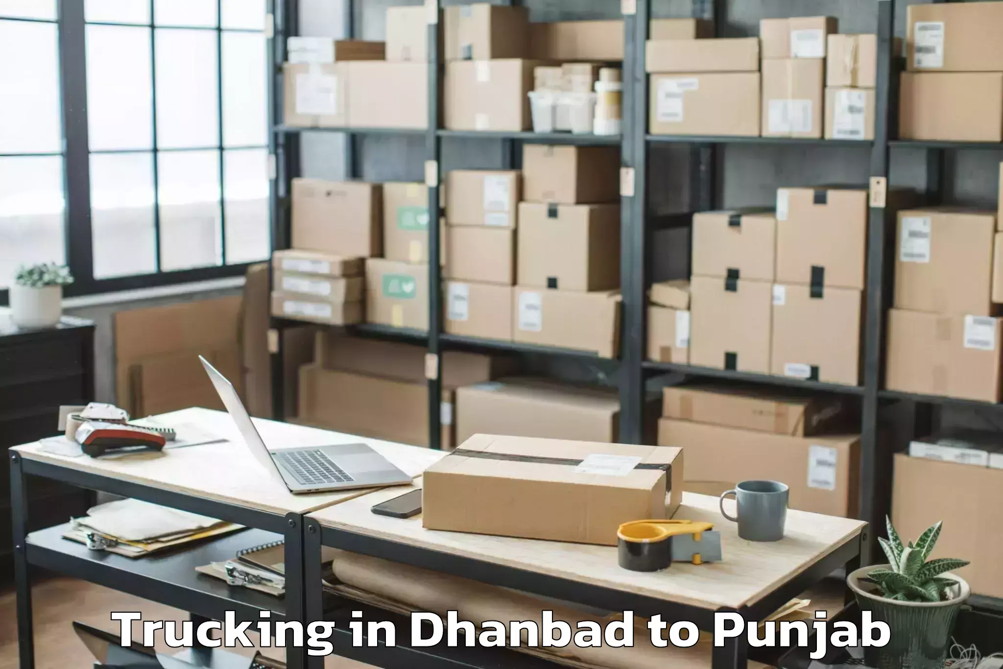 Easy Dhanbad to Guru Kashi University Talwandi Trucking Booking